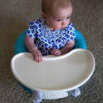 Maisie Sitting in Bumbo Before School