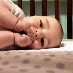 Maisie In Her Crib