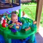 Maisie in the Exersaucer Outside